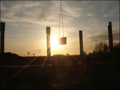 Neubau Instandsetzungshalle Impression Sonnenuntergang